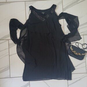 Sexy black dress with shear fabric details and elegant beading in 20W